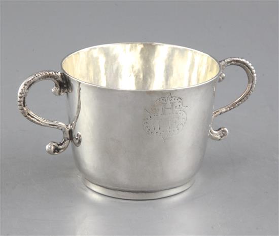 A James II silver porringer, 127 grams.